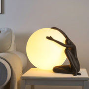 Humanoid Ball Holding Table Lamp - Vakkerlight