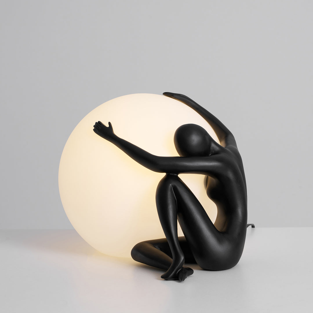 Humanoid Ball Holding Table Lamp