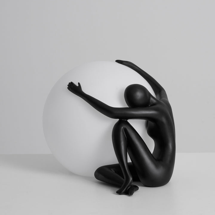 Humanoid Ball Holding Table Lamp