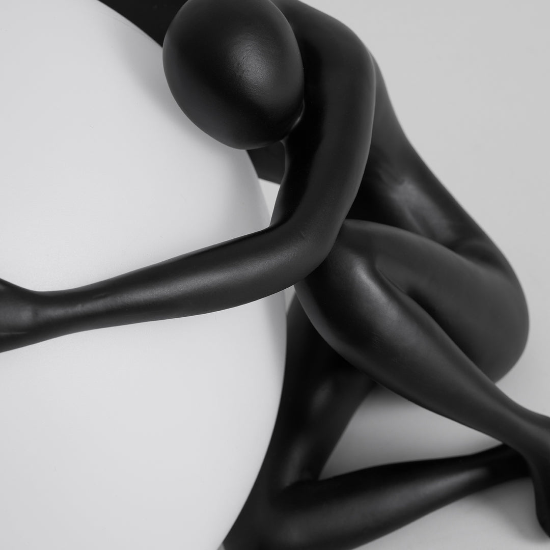 Humanoid Ball Holding Table Lamp