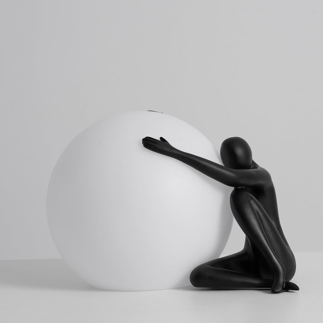 Humanoid Ball Holding Table Lamp